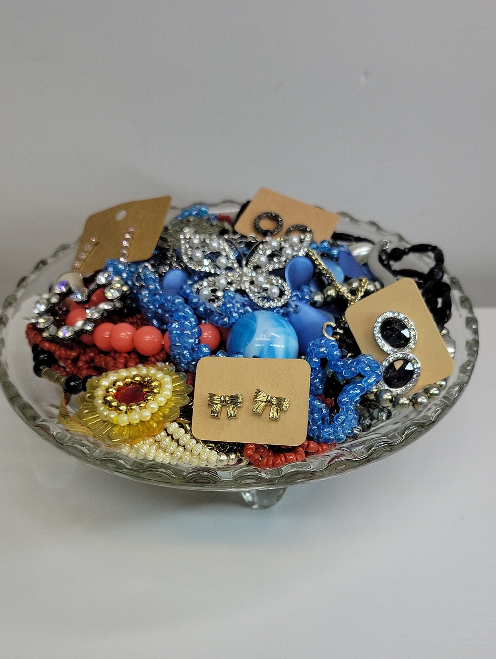 Glass Dish Filled With Jewelry